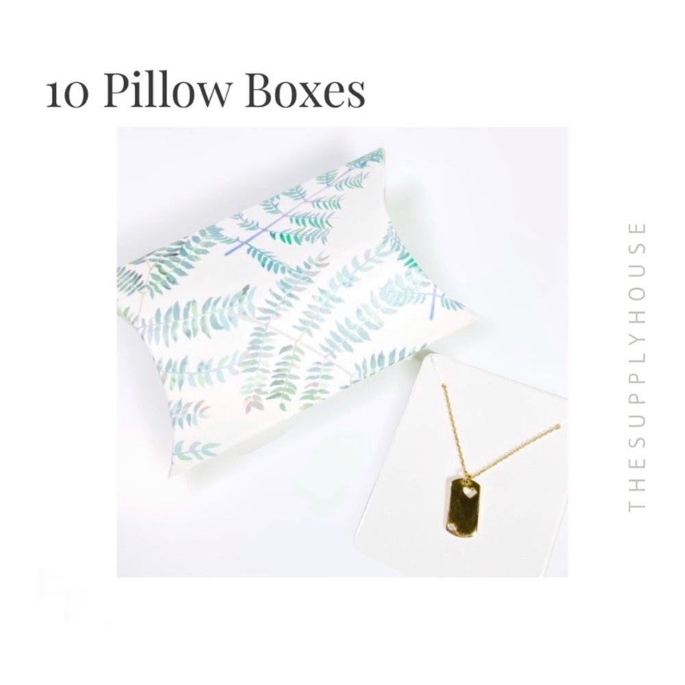 Pillow boxes with insert cards for jewelry.